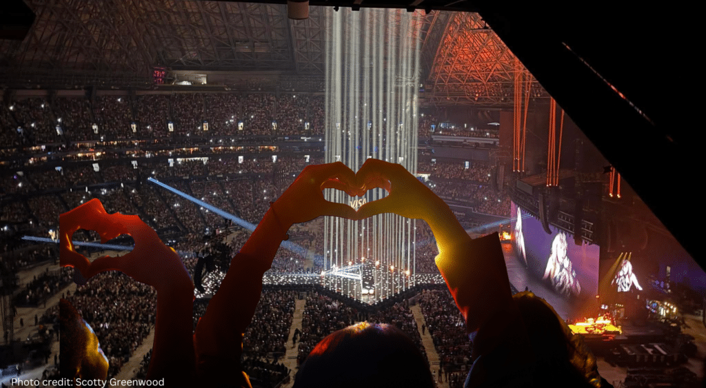 Taylor Swift Eras Tour Reputation set in Toronto, with hands making a heart showing love